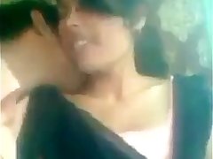 Indian girl kissing on public place